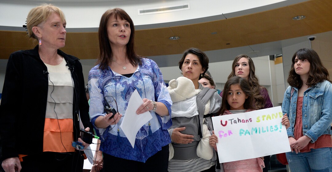 (Al Hartmann  |  The Salt Lake Tribune)  Judi Hilman with Salt Lake Indivisible, left, and Sharlee Glenn with Mormon Women for Ethical Government gathered with Mormon women and other concerned citizens at the Salt Lake City Airport in a show of solidarity for an area woman, Isabel, who has been ordered to leave the United States by ICE agents. 
ICE  escorted her onto a flight bound for Columbia. Isabel is a single mother and is the sole caretaker for her disabled son and her 86-year-old mother.
