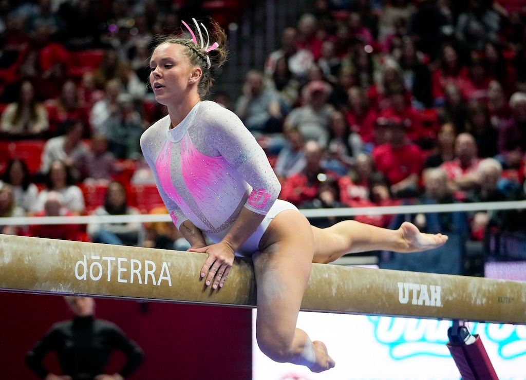 (Bethany Baker  |  The Salt Lake Tribune) Utah’s Maile O’Keefe performs on the beam as Utah hosts Stanford, NCAA gymnastics at the Huntsman Center in Salt Lake City on Friday, Feb. 23, 2024.
