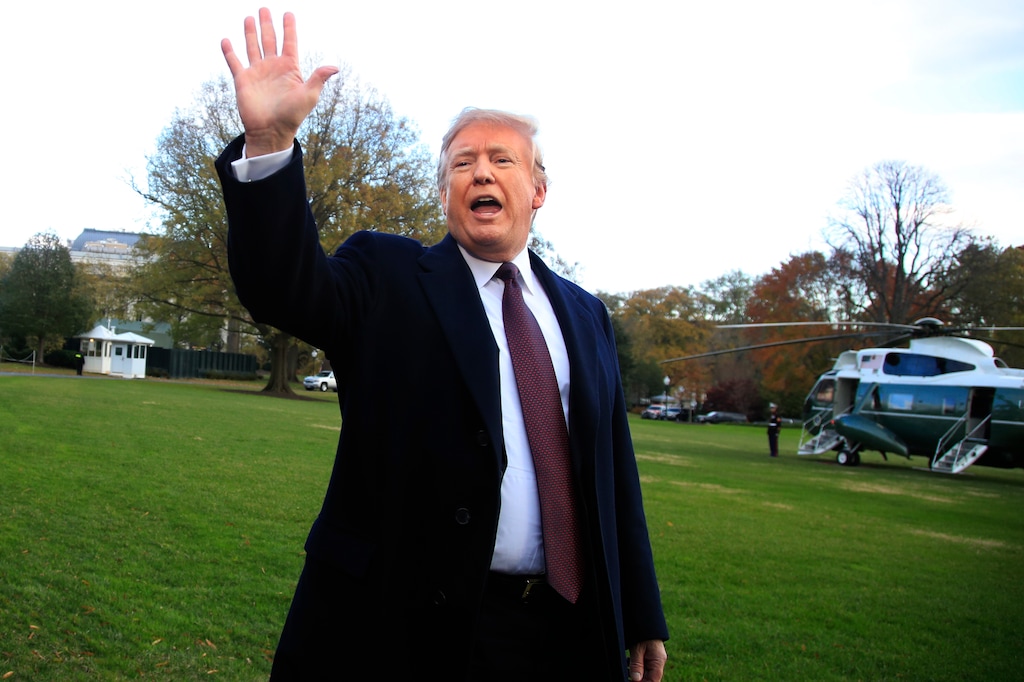 (Manuel Balce Ceneta | The Associated Press) President Donald Trump waves after speaking to the media before leaving the White House in Washington, Tuesday, Nov. 20, 2018, to travel to Florida, where he will spend Thanksgiving at Mar-a-Lago.