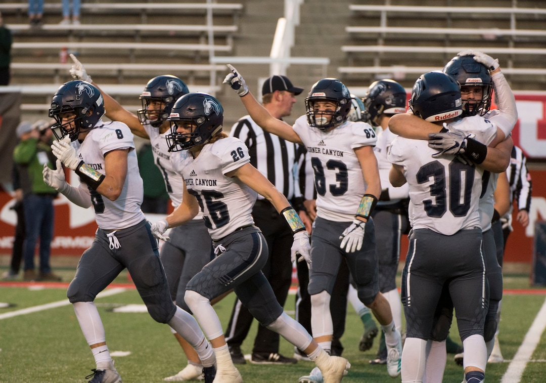 (Rick Egan  |  The Salt Lake Tribune)     Corner Canyon celebrates their win over  the Titans, in 5A football semifinal action between Olympus and Corner Canyon at Rice-Eccles Stadium, Thursday, Nov. 8, 2018.