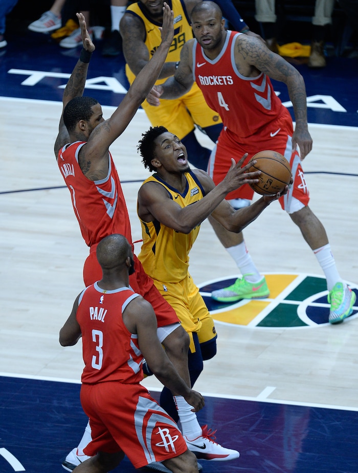 (Francisco Kjolseth | The Salt Lake Tribune) Utah Jazz guard Donovan Mitchell (45) is pressured on his way to the basket against the Houston Rockets in Game 4 of the NBA playoffs at the Vivint Smart Home Arena Sunday, May 6, 2018 in Salt Lake City. Houston took a 3-1 series lead over the Jazz with a final score of 100 to 87.
