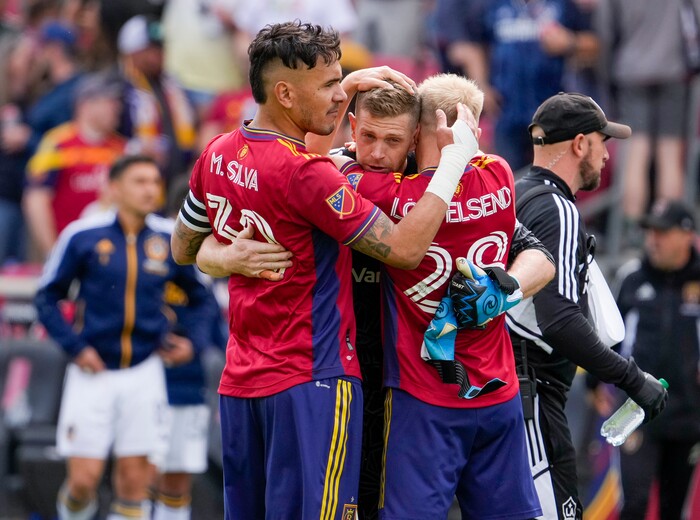 (Leah Hogsten | The Salt Lake Tribune) l-r Real Salt Lake defender Marcelo Silva (30), Real Salt Lake goalkeeper Zac MacMath (18) and Real Salt Lake defender Jasper Löffelsend (28) celebrate the win against LA Galaxy at Rio Tinto Stadium, Saturday, April 30, 2022. Real Salt Lake defender Marcelo Silva (30) scored the one goal to win the match 1-0.