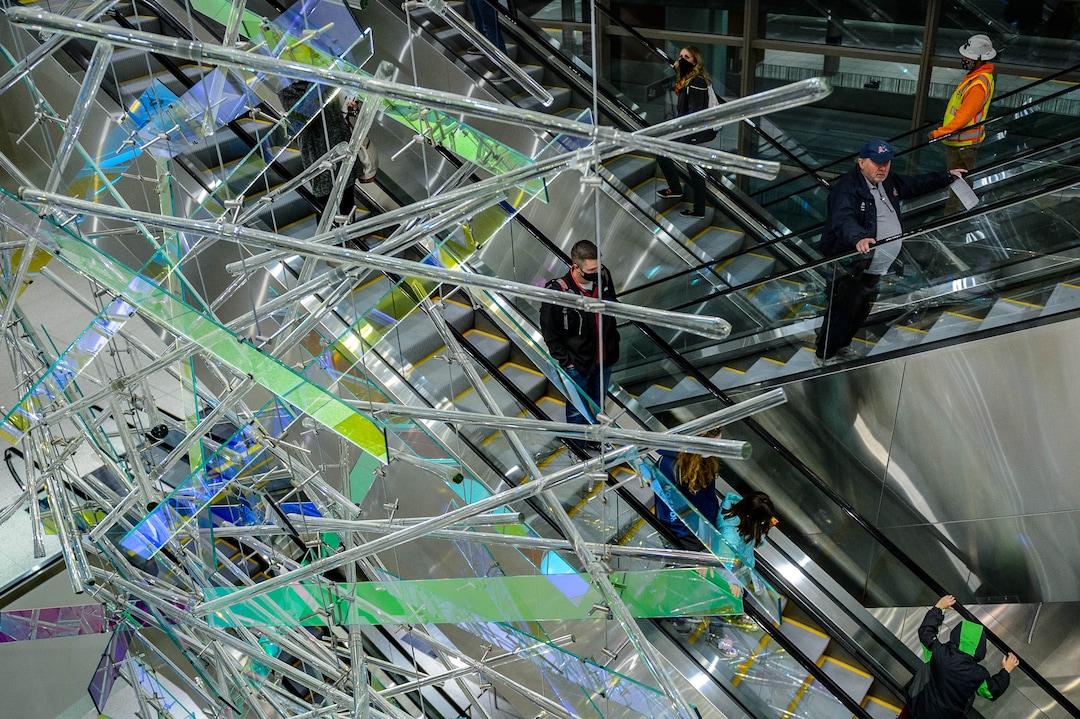 (Trent Nelson  |  The Salt Lake Tribune) Travelers pass by "The Falls," an art installation by Gordon Huether at the Salt Lake City International Airport on Tuesday, Oct. 27, 2020.
