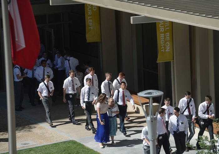 Al Hartmann  |  The Salt Lake TribuneMissionaries come and go on the plaza of the new building at the Missionary Training Center in Provo Wednesday July 26.  It opened in June. 