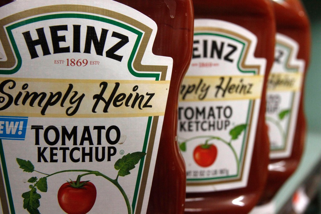 (Toby Talbot | The Associated Press) This March 2, 2011, file photo, shows containers of Heinz ketchup on the shelf of a market, in Barre, Vt. Kraft shareholders have approved the sale of the company to ketchup maker H.J. Heinz, creating one of the world's largest food companies with annual revenue of about $28 billion.
