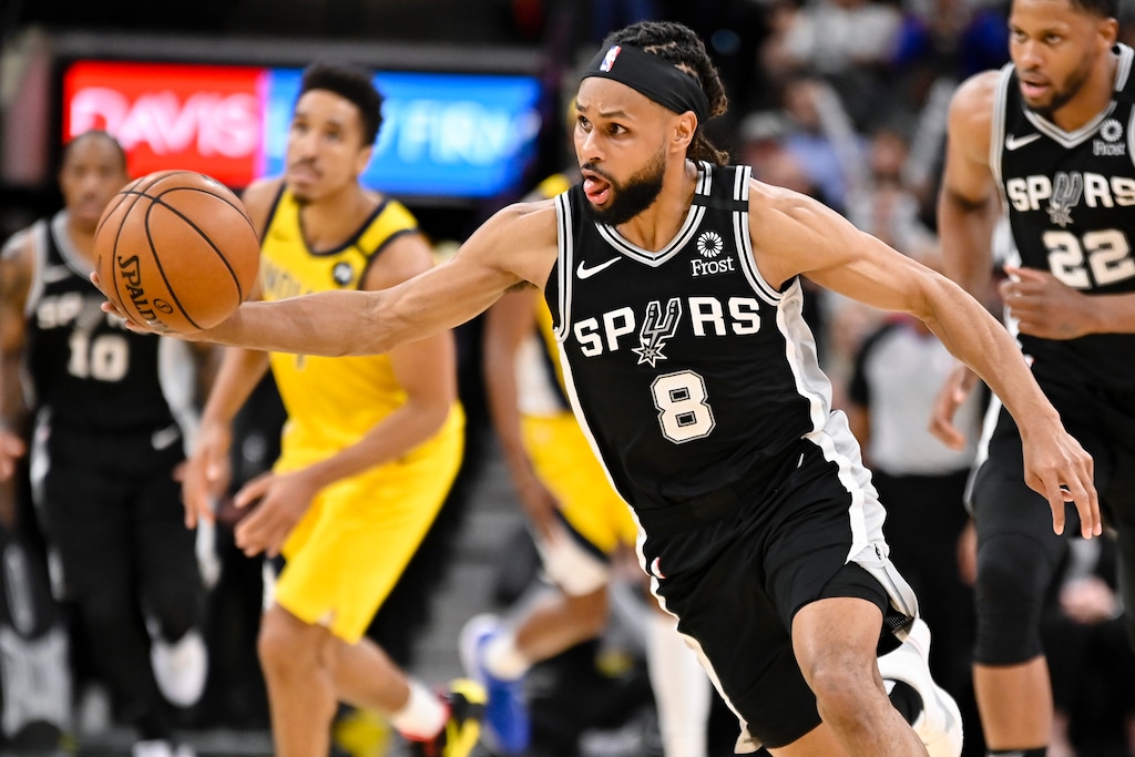 San Antonio Spurs' Patty Mills runs upcourt during the second half of an NBA basketball game against the Indiana Pacers, Monday, March 2, 2020, in San Antonio. (AP Photo/Darren Abate)