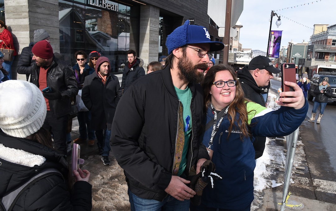 (Francisco Kjolseth  |  The Salt Lake Tribune)  Actor Martin Starr pauses for a selfie with Brieann McDonald of Nashville as they join the scene along Main Street in Park City as the Sundance Film Festival kicks into high gear Friday, Jan. 25, 2019, with fans hoping to snap a selfie with a celebrity, autograph seekers, paparazzi and locals.
