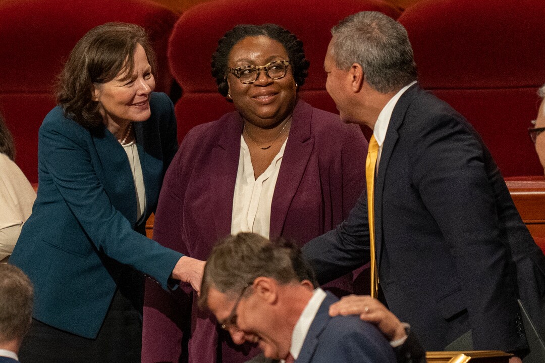 (Rick Egan | The Salt Lake Tribune) Newly called Primary President Susan H. Porter and Second Counselor Tracy Y. Browning shake hands with church leaders after the afternoon session of LDS General Conference on Saturday, April 2, 2022.
