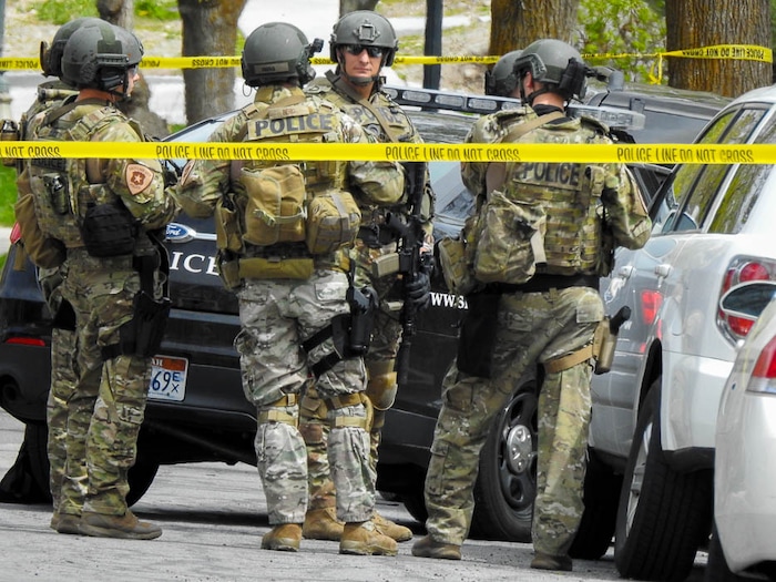 (Trent Nelson | The Salt Lake Tribune)  
Law enforcement at the scene after an incident where a man barricaded himself in a house on Princeton Avenue near 1100 East in Salt Lake City, Wednesday April 18, 2018.