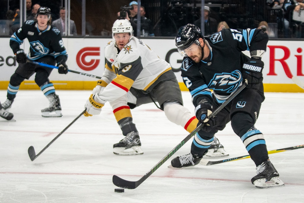(Rick Egan | The Salt Lake Tribune)Utah Mammoth MacKenzie Weegar (52) looks for a shot as Vegas Golden Knights defenseman Brayden McNabb (3) defends against him.