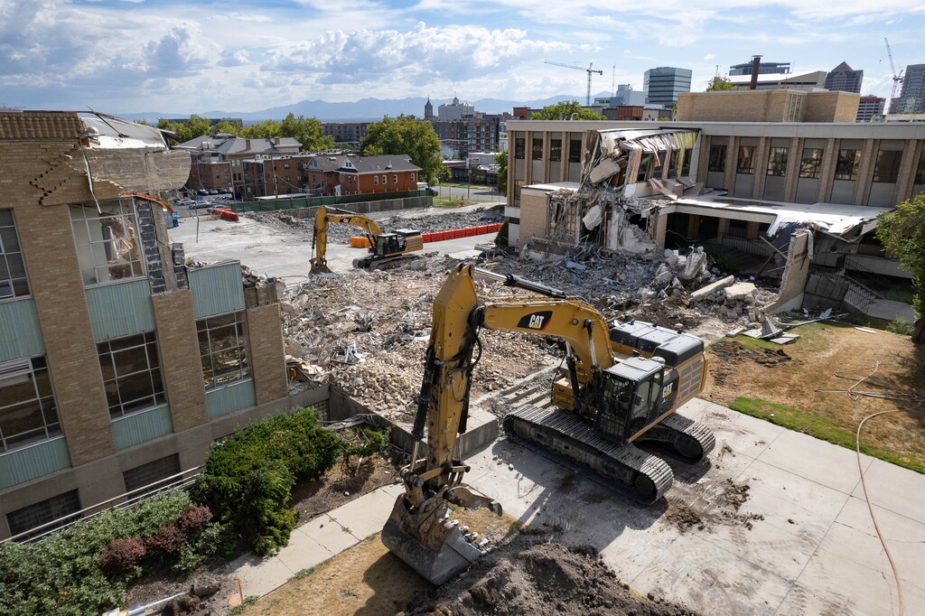 (Francisco Kjolseth | The Salt Lake Tribune) Salt Lake City School District begins the destruction of its longtime office building, shown on Aug. 10, 2022. The headquarters are the last district building to be rebuilt for earthquake safety.