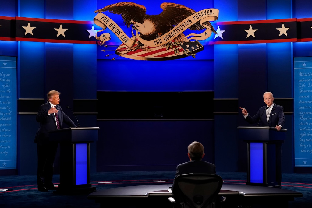 (Patrick Semansky | AP file photo)  President Donald Trump, left, and Democratic presidential candidate former Vice President Joe Biden, right, with moderator Chris Wallace, center, of Fox News participate in the first presidential debate of the 2020 election at Case Western University and Cleveland Clinic, in Cleveland, Ohio, on Tuesday, Sept. 29, 2020.