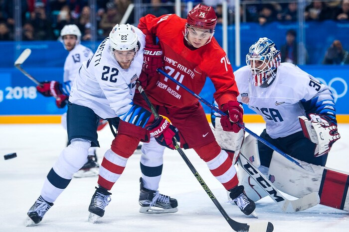 (Chris Detrick  |  The Salt Lake Tribune)  United States defenseman Bobby Sanguinetti (22) and Olympic Athlete from Russia forward Nikolai Prokhorkin (74) during the United States vs Olympic Athletes from Russia hockey game at Gangneung Hockey Centre during the Pyeongchang 2018 Winter Olympics Saturday, Feb. 17, 2018. Olympic Athletes from Russia defeated United States 4-0.