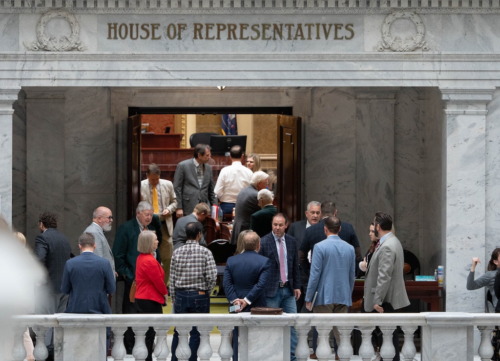 (Francisco Kjolseth | The Salt Lake Tribune) Work is carried out outside the house floor at the Capitol in Salt Lake City on Friday, March 4, 2022, during the final day of the Utah Legislature’s 2022 general session.