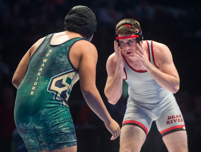 (Rick Egan  |  The Salt Lake Tribune)   Logan Pond (Bear River) wrestlesTuiits Kanosh (Snow Canyon).  Pond own the match (Dec 5-2) in the 4A State Wrestling at UVU in Orem, Saturday, February 10, 2018.