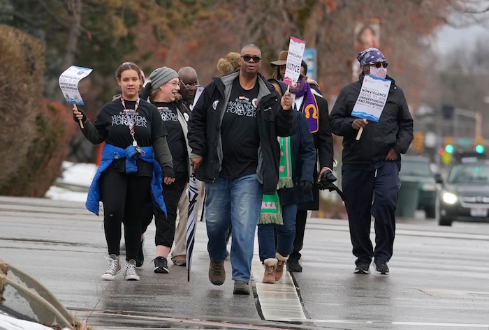 (Leah Hogsten | The Salt Lake Tribune) Over 200 people participated in the march from East High School to Kingsbury Hall on Monday. To commemorate the legacy and work of Martin Luther King, Jr. and many other activists fighting for racial equality during the Civil Rights movement, the University of Utah's office of Equity, Diversity & Inclusion kicked off MLK Week 2023 with a rally at East High School, followed by a march to Kingsbury Hall, Jan. 16, 2023. 