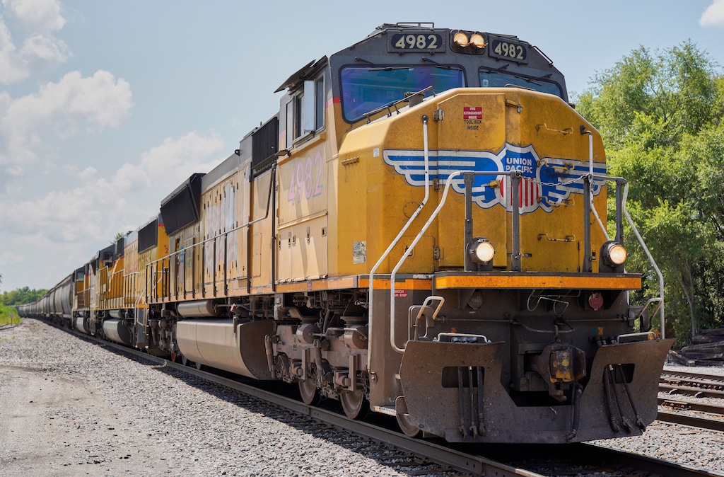 FILE- In this July 31, 2018, file photo a Union Pacific train travels through Union, Neb. Union Pacific Corp. reports earnings Thursday, Oct. 25. (AP Photo/Nati Harnik, File)