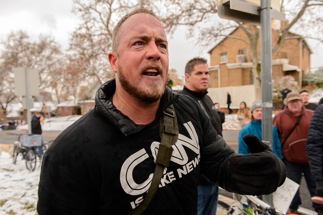 (Trent Nelson | The Salt Lake Tribune)  A man yells at the crowd after an altercation during a rally protesting a visit by President Donald Trump, Monday December 4, 2017.