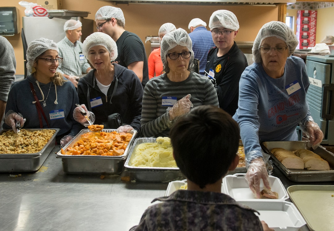 (Rick Egan  |  The Salt Lake Tribune)   Wednesday, Nov. 21, 2018.

Volunteers serve at the 25th Annual Thanksgiving Dinner for the hungry and homeless at the Christian Life Center on Redwood Road in Salt Lake City, Wednesday, Nov. 21, 2018.