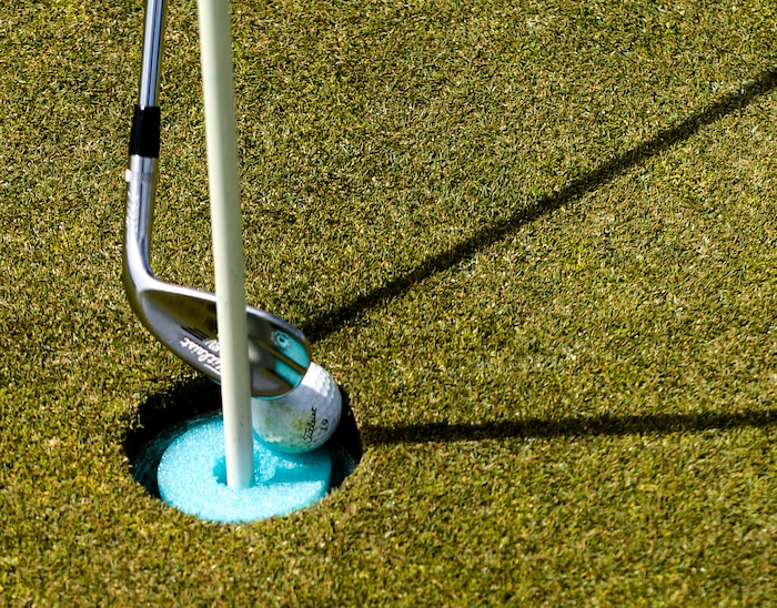 (Leah Hogsten | The Salt Lake Tribune) Online tee time reservations and foam bumpers in the cups at Rose Park Golf Course ensures golfers are mindful of hygiene on the links, April 9, 2020.