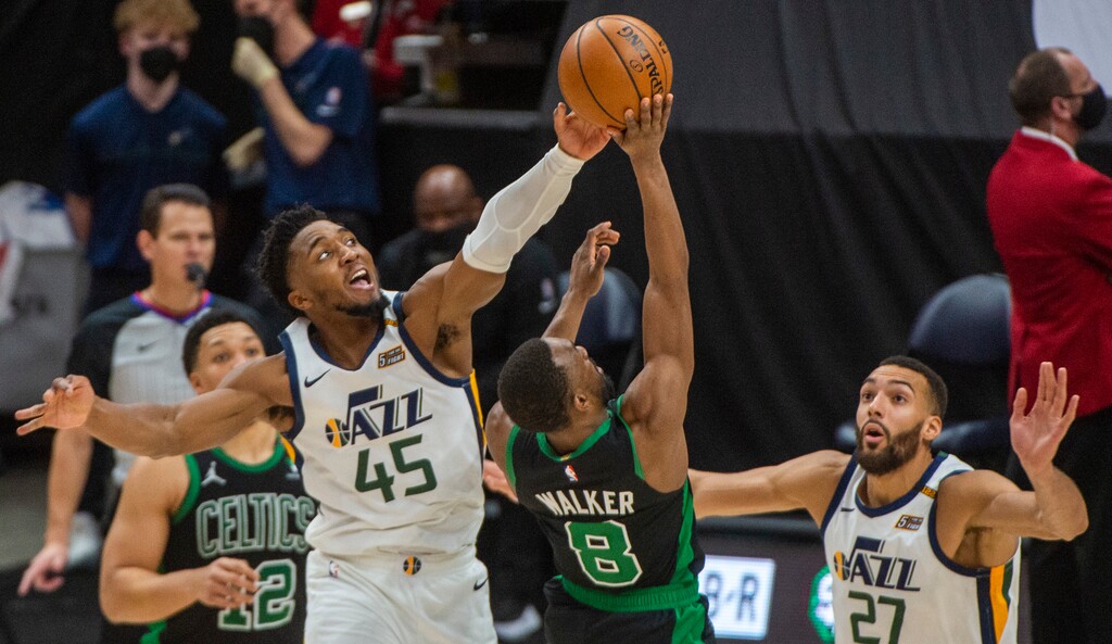  (Rick Egan | The Salt Lake Tribune) Utah Jazz guard Donovan Mitchell (45) blocks a shot by Boston Celtics guard Kemba Walker (8), in NBA action between the Utah Jazz and the Boston Celtics, at Vivint Arena, on Tuesday, Feb. 9, 202
