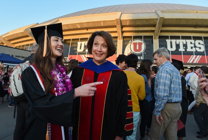 (Francisco Kjolseth  |  The Salt Lake Tribune)  University of Utah President Ruth Watkins meets with students, including nursing graduate Caitlin Keenan, after commencement ceremonies on Thursday, May 3, 2018, at the Jon M. Huntsman Center.