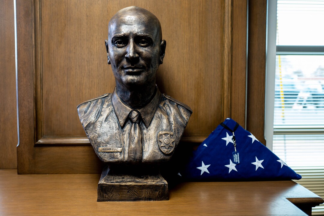 (Trent Nelson  |  The Salt Lake Tribune) A memorial bust in the lobby of the David P. Romrell Public Safety Building on Sunday Nov. 24, 2019. The building is named after Officer Romrell, who was killed in the line of duty on Nov. 24, 2018 - one year ago.