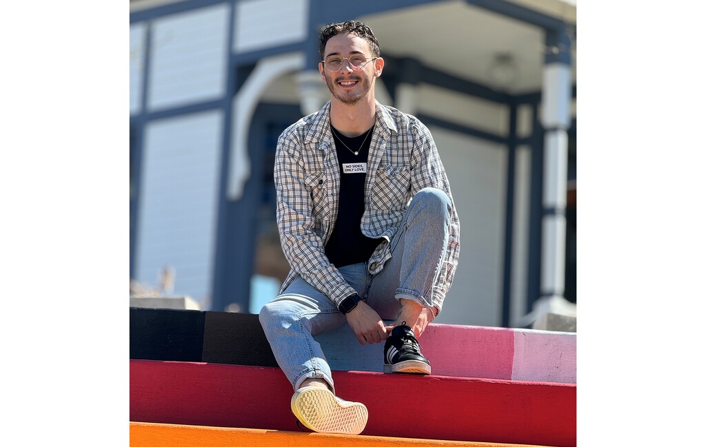 (Photo courtesy of Shem Busenbark) Shem Busenbark, 24, he says he’s “really lucky” to be able to help other young Utahns find community and self-expression as Encircle Provo’s assistant home director.