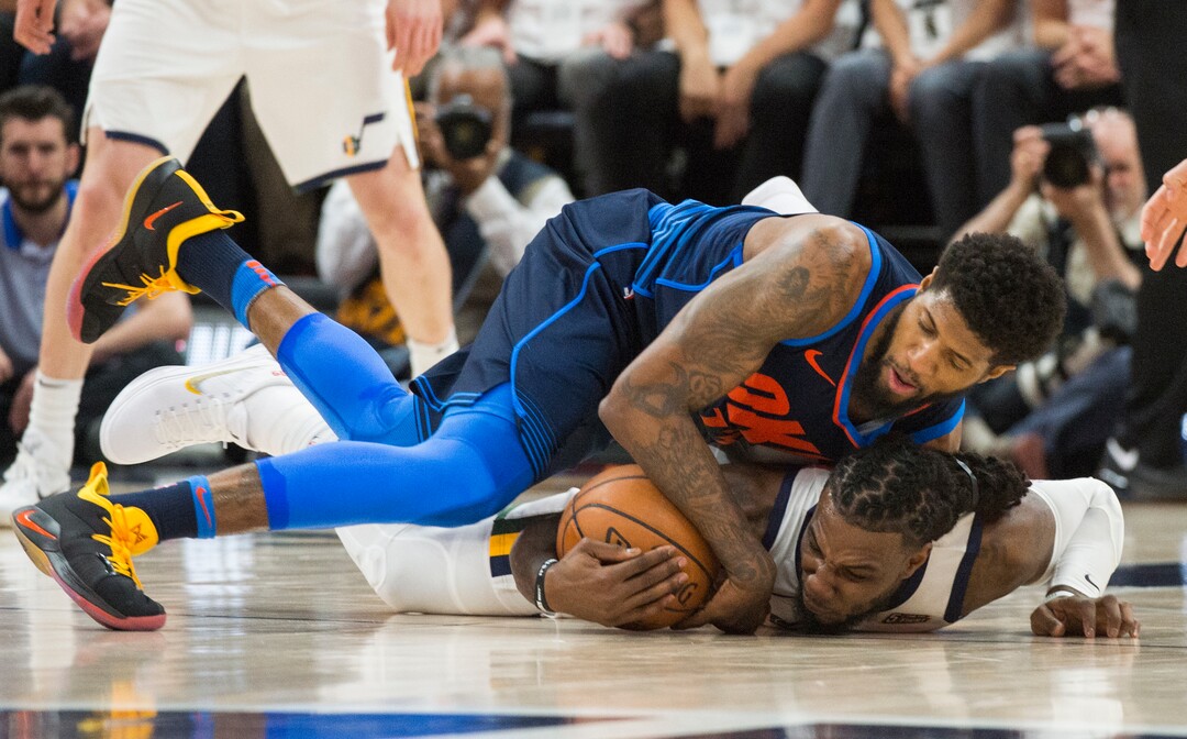(Rick Egan  |  The Salt Lake Tribune)    Oklahoma City Thunder forward Paul George (13) goes for a loose ball along with Utah Jazz forward Jae Crowder (99), in game 4, NBA playoff action between Utah Jazz and Oklahoma City Thunder, in Salt Lake City, Monday April 23, 2018.