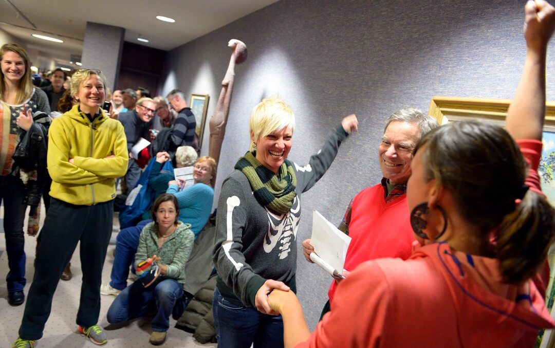 Keith Johnson | The Salt Lake Tribune Elisa Noel, facing, celebrates with her new wife Amber Burnham after they were married by Salt Lake City mayor Ralph Becker outside the Salt Lake County clerks office, Friday, December 20, 2013. A federal judge in Utah Friday struck down the stateÕs ban on same-sex marriage, saying the law violates the U.S. ConstitutionÕs guarantees of equal protection and due process.