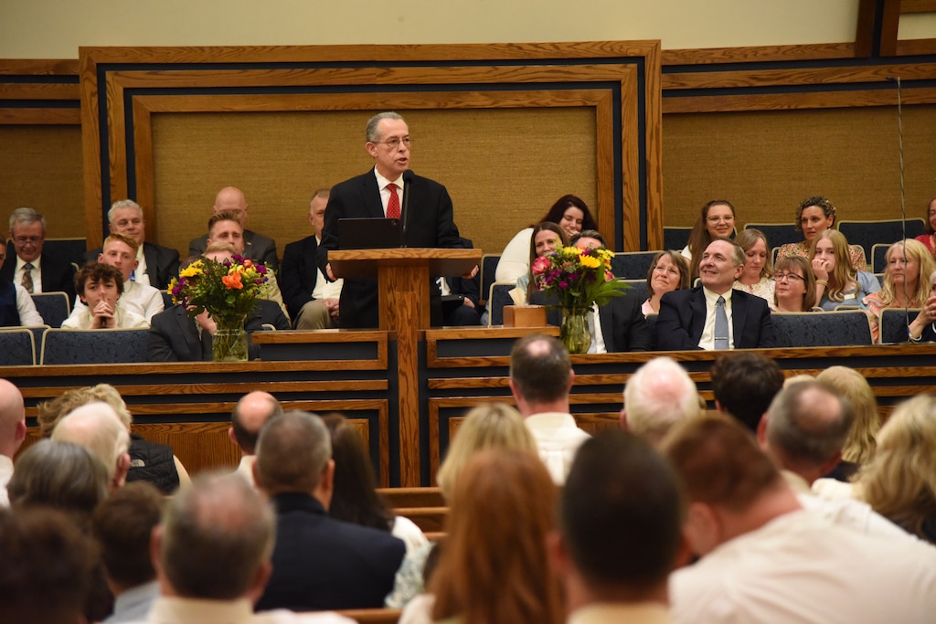 (The Church of Jesus Christ of Latter-day Saints) General authority Seventy Hugo E. Martinez of the United States West Area Presidency reads an announcement from the First Presidency of a temple to be built in Marysville, Washington. He spoke at a devotional for Latter-day Saints in the Marysville Washington Stake on Sunday, April 19, 2026.