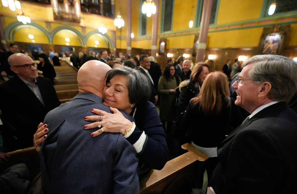 (Francisco Kjolseth | The Salt Lake Tribune) Phyllis Pettit Nassi, widow of Valter Nassi , the big-hearted Salt Lake City restaurateur who served fine Italian food for for more than two decades and made numerous friends, is embraced following a celebration of life service at Cathedral of the Madeleine on Thursday, Nov. 10, 2022.
