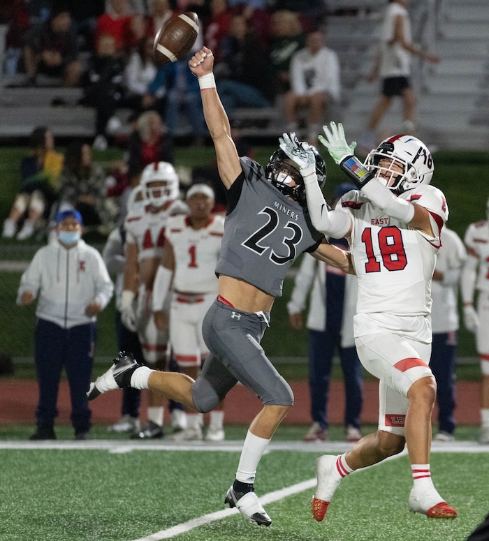 (Francisco Kjolseth | The Salt Lake Tribune) Miles Preston (23) of Park City breaks up a pass intended for Spencer Black (18) of East Hight In prep football action at Park City on Friday, Sept. 3, 2021.