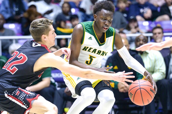 (Leah Hogsten  |  The Salt Lake Tribune) Weber's Brandon Capener (22) pressures Kearns' David Andrew (03). Weber defeated Kearns 60-52 in the 6A High School Boys' Basketball Tournament opening game at Weber State University’s Dee Events Center in Ogden, Tuesday, Feb. 27, 2018. 