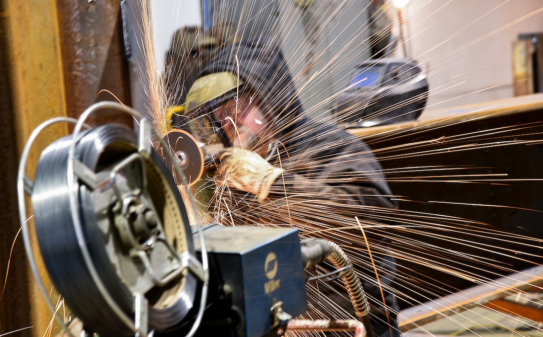 (Francisco Kjolseth  |  The Salt Lake Tribune)  Brook Matthews at Structural Steel and Plate Fabrication in North Salt Lake uses a grinder on a large order bound for a Morton Salt plant in Grantsville. Recent metal tariffs implemented by the Trump administration though a boom for steel producers has negatively impacted metal fabrication businesses creating numerous challenges.  