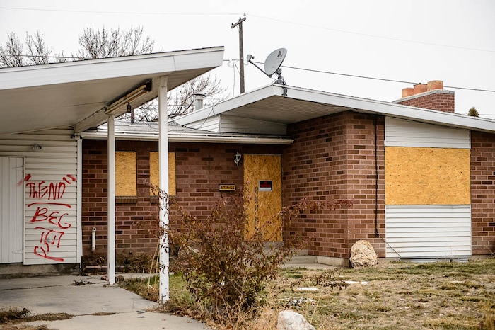 (Trent Nelson | The Salt Lake Tribune)  
UDOT is buying 49 homes in Midvale to widen I-15, and 24 are vacant. The neighborhood is having trouble with homeless people breaking in and trying to squat there. UDOT promises to start demolition next week. Tuesday Dec. 11, 2018.