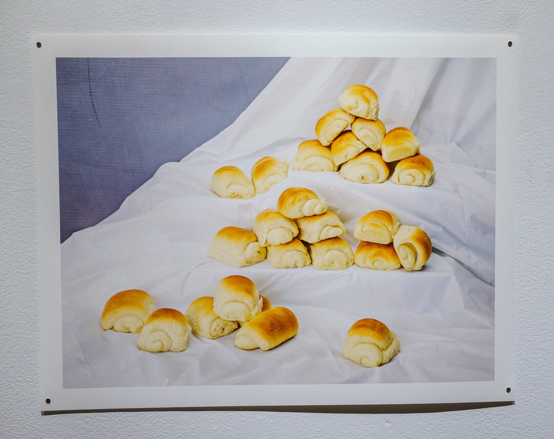 (Leah Hogsten | The Salt Lake Tribune) Doctrine #6 (Lion House Rolls) Archival Pigment Print, 2021, from "Marrow" a photo exhibit by Daniel George at The Utah Museum of Contemporary Art. George examines the culinary and cultural heritage of members of The Church of Jesus Christ of Latter-day Saints, Sept. 3 2021. George recreated and photographed dishes from Ward Cookbooks, including Funeral Potatoes, Casseroles, Jello creations, turning food into folk art.