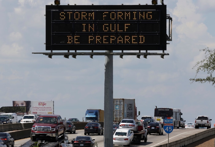 (David J. Phillip | The Associated Press) Motorists in Houston pass a sign warning of Hurricane Harvey as the storm intensifies in the Gulf of Mexico, Thursday, Aug. 24, 2017. Harvey is forecast to be a major hurricane when it makes landfall along the middle Texas coastline Friday.