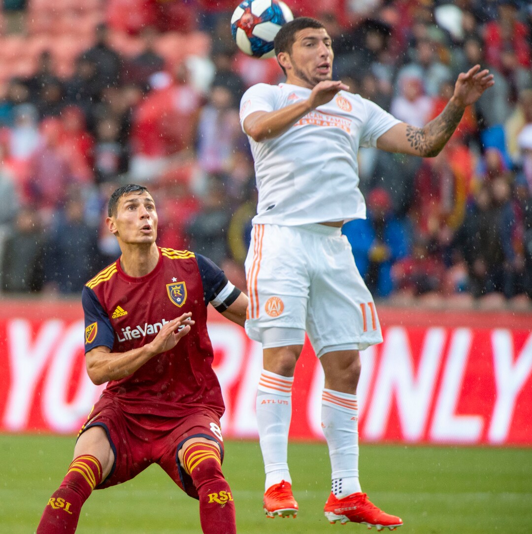 (Rick Egan  |  The Salt Lake Tribune).  Real Salt Lake midfielder Damir Kreilach (8) goes for the ball along with Atlanta United midfielder Eric Remedi (11), in MLS soccer action between Real Salt Lake and Atlanta United at Rio Tinto Stadium in Sandy, Friday, May 24, 2019.