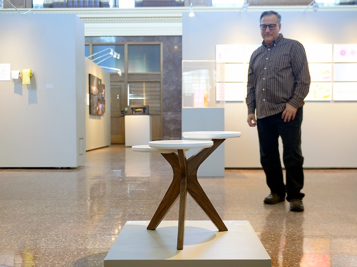 (Chris Samuels | The Salt Lake Tribune) David Evett shows his Lily Table design at a showcase for Utah Design Arts at the Rio Grande Depot in Salt Lake City, Sept. 12, 2019.