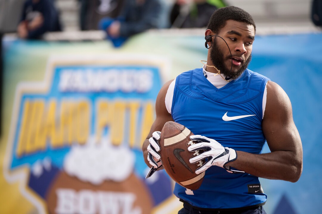 (Jeremy Harmon  |  The Salt Lake Tribune) Brigham Young Cougars wide receiver Akile Davis (1) catches the ball as BYU warms up before facing the Western Michigan Broncos in the Famous Idaho Potato Bowl in Boise, Idaho, on Friday, Dec. 21, 2018.