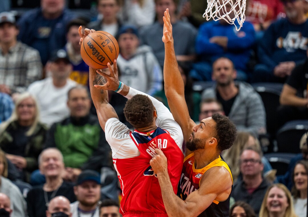 (Rick Egan | The Salt Lake Tribune) Utah Jazz center Rudy Gobert (27) blocks a shot by Washington Wizards center Daniel Gafford (21), in NBA action between the Utah Jazz and the Washington Wizards, at Vivint Arena on Saturday, Dec. 18, 2021.