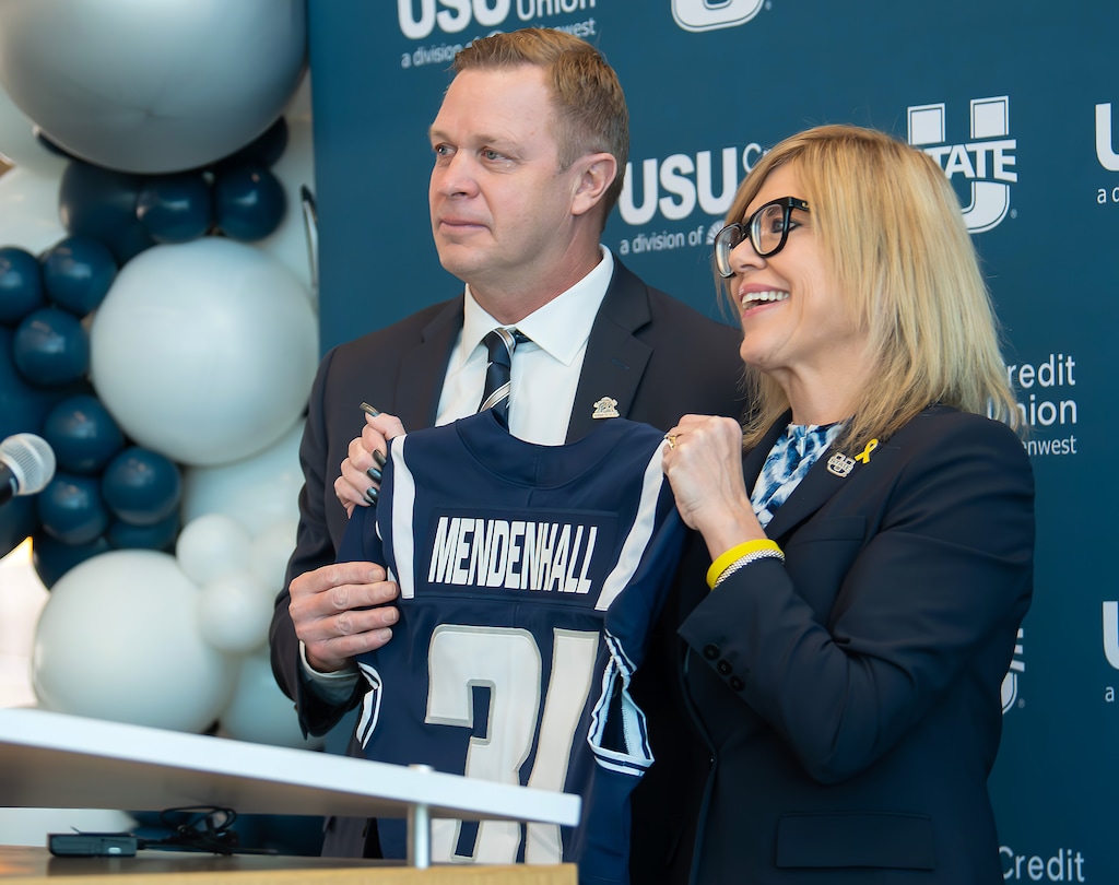 (Eli Lucero | Herald Journal) Bronco Mendenhall, left, and Athletics Director Diana Sabau attend a press conference where Mendenhall was introduced as the new football coach at Utah State University, Monday Dec. 9, 2024, in Logan.