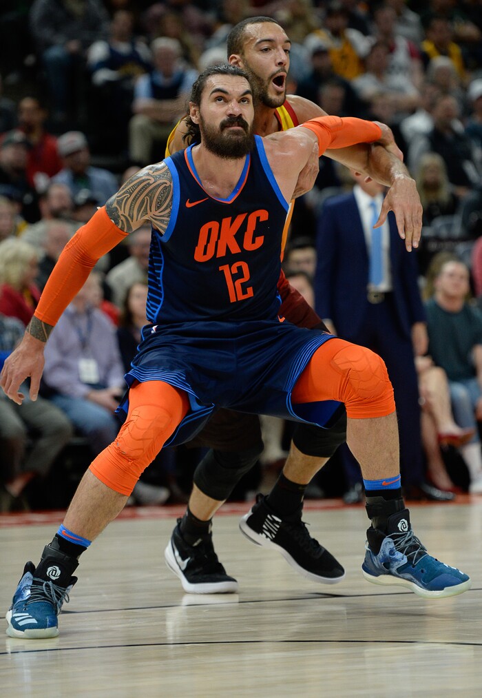 (Francisco Kjolseth  |  The Salt Lake Tribune)  Oklahoma City Thunder center Steven Adams (12) puts the block on Utah Jazz center Rudy Gobert (27) during a free throw in the NBA game at Vivint Smart Home Arena Sat., Dec. 22, 2018, in Salt Lake City.