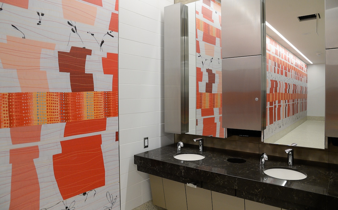 (Francisco Kjolseth  |  The Salt Lake Tribune) Quilt art by Nancy Bardach is replicated and installed on the wall in one of the bathrooms as crews continue their work in the first phase of construction of the Salt Lake City International Airport on Wednesday, May 20, 2020.