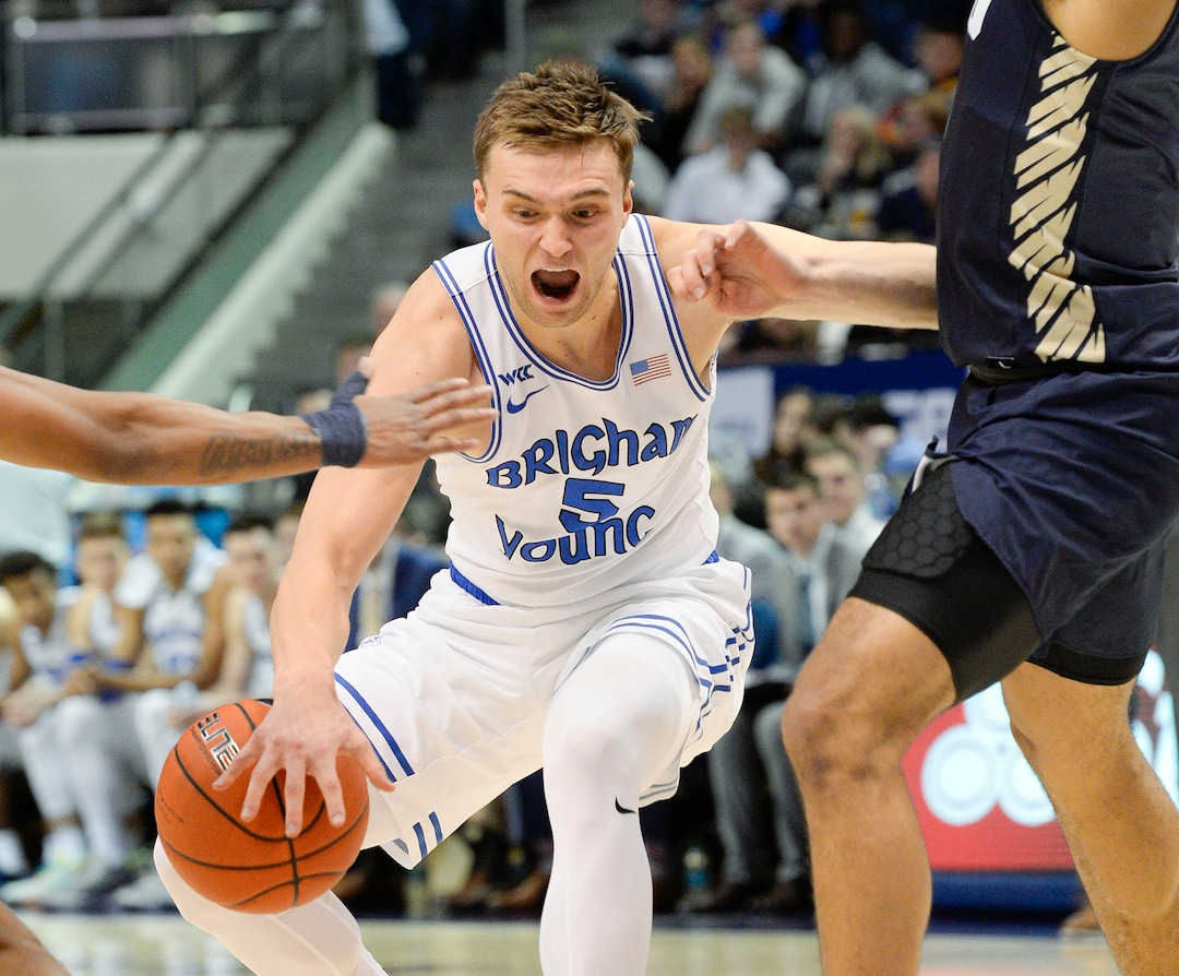 (Leah Hogsten  |  The Salt Lake Tribune) Brigham Young Cougars guard Jake Toolson (5) loses control driving down the court as Brigham Young University hosts Oral Roberts, Dec. 28, 2019 at the Marriott Center in Provo.