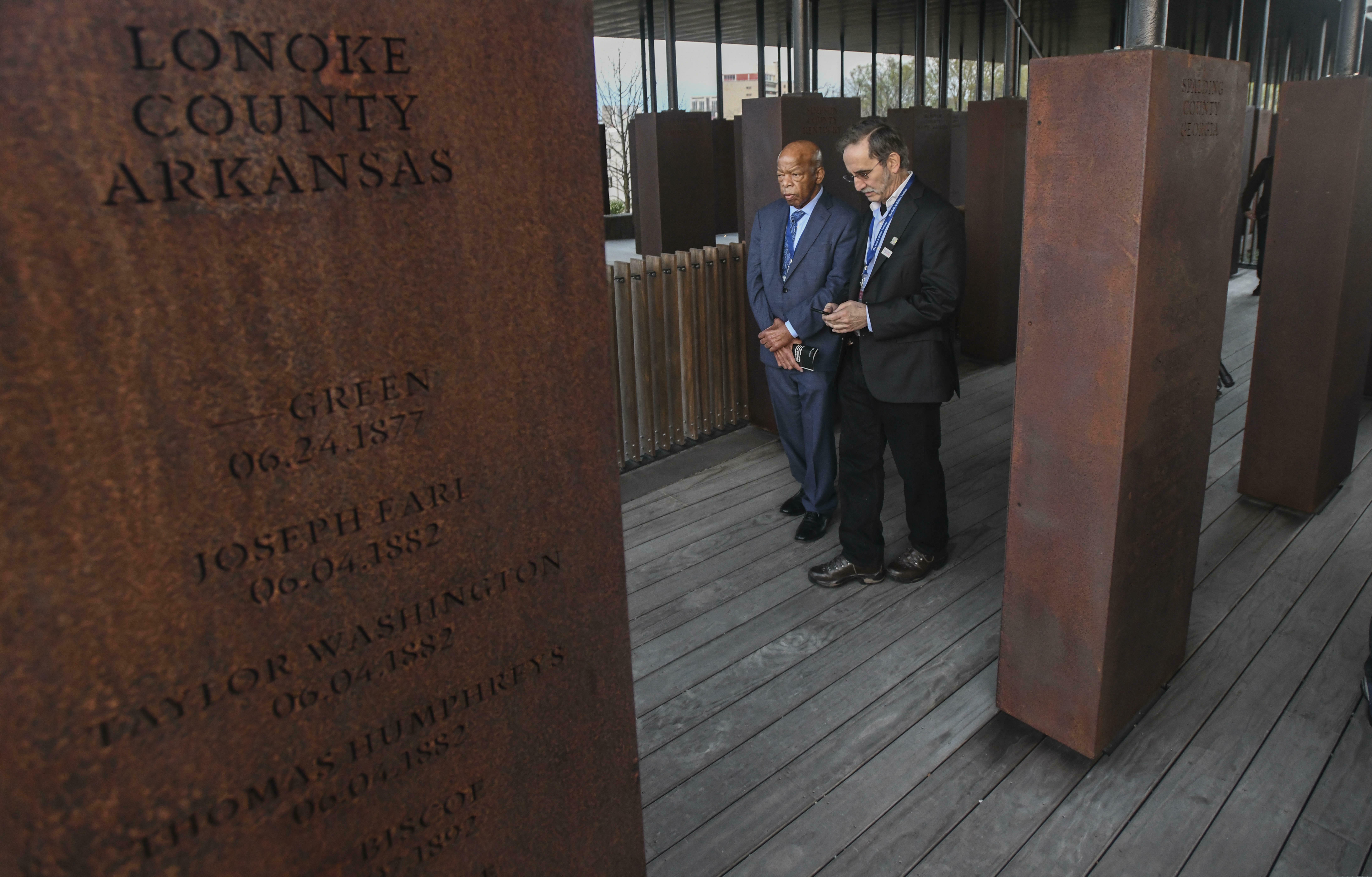 U.S. Rep. John Lewis, D-Ga., left, and David Goodman tour the National Memorial for Peace and Justice in Montgomery, Ala., Friday, March 1, 2019, during a stop on the Congressional Civil Rights Pilgrimage. (AP Photo/Julie Bennett)