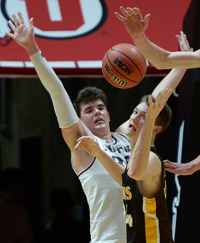 (Francisco Kjolseth  |  The Salt Lake Tribune)  Davis vs Lone Peak, 6A State high school basketball tournament at the Huntsman Center in Salt Lake City, Thursday March 1, 2018. Jackson Brinkerhoff (3) puts the pressure on Rich Stuck (34). 