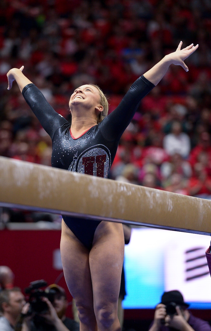 (Leah Hogsten  |  The Salt Lake Tribune) Outgoing senior Maddy Stover thanks the fans after her beam routine as the No. 4 Utah gymnasts host No. 20 Georgia in the final regular season meet at Jon M Huntsman Center in Salt Lake City Friday, March 16, 2018. 