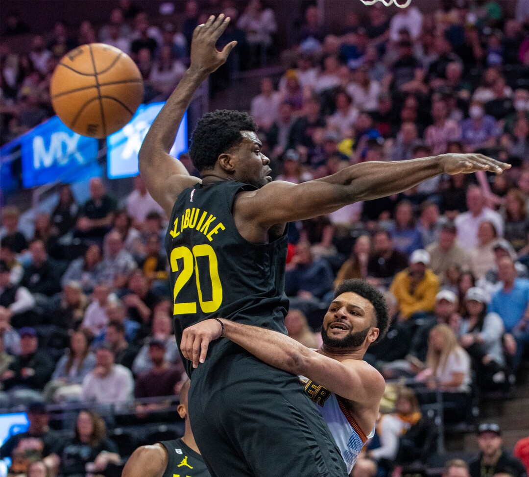 (Rick Egan | The Salt Lake Tribune) Denver Nuggets guard Jamal Murray (27) throws a pass around Utah Jazz center Udoka Azubuike (20), in NBA action between the Utah Jazz and the Denver Nuggets at Vivint Arena,  Saturday, April 8, 2023.
